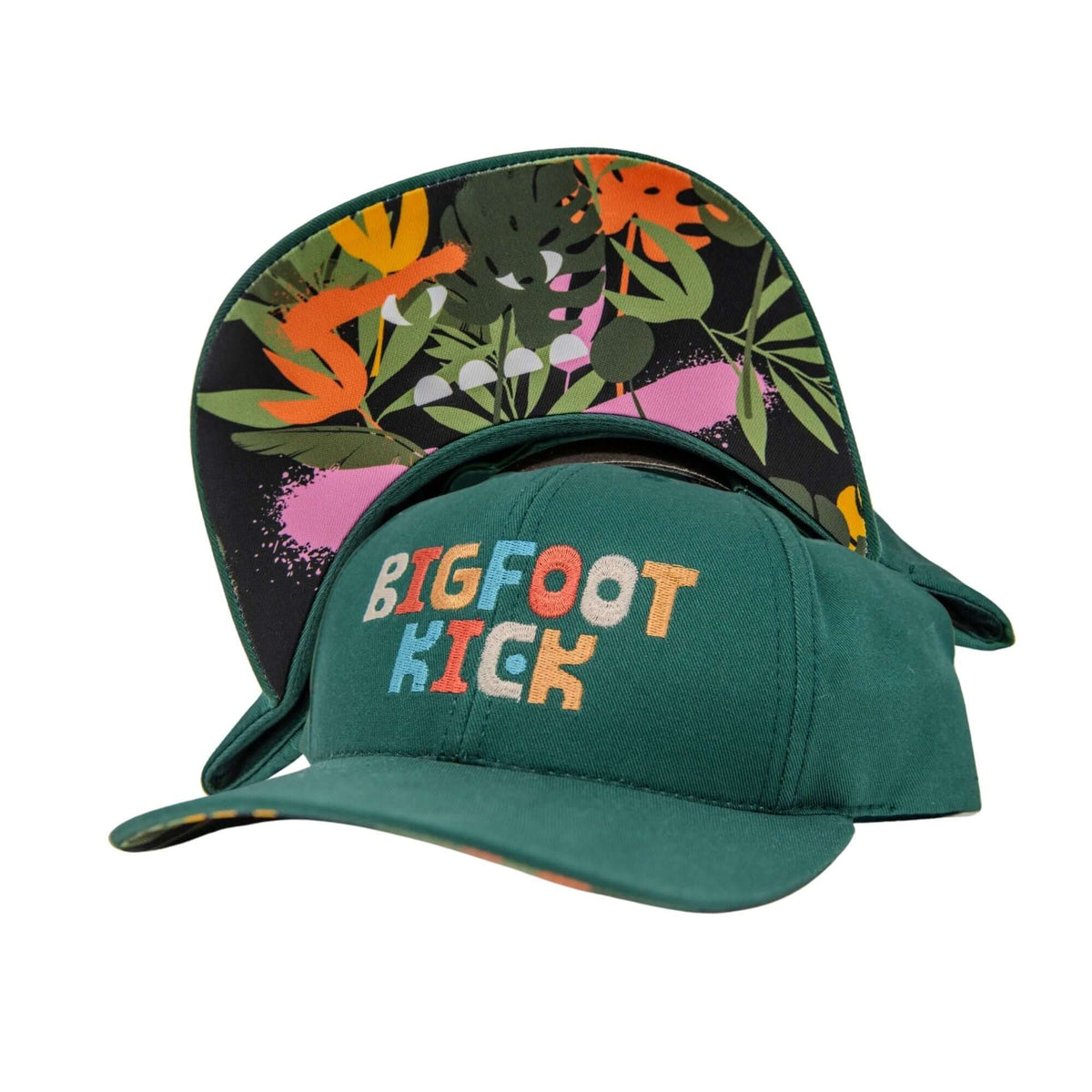 Hidden Bigfoot Hat featuring colorful 'BIGFOOT KICK' text and vibrant tropical design on the underside.