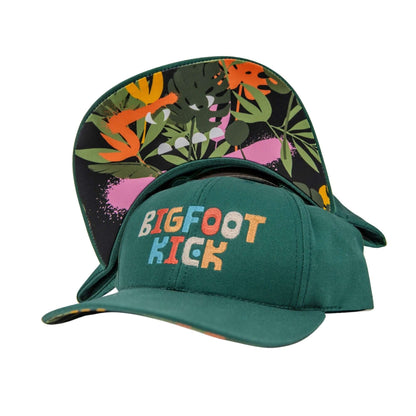 Hidden Bigfoot Hat featuring colorful 'BIGFOOT KICK' text and vibrant tropical design on the underside.