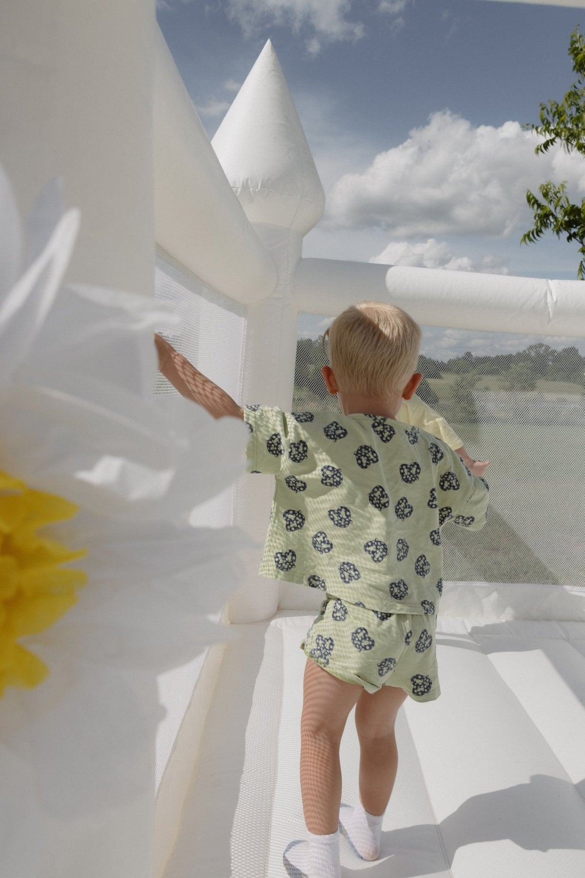 Pretzel Short Sleeve Play Set side view on child